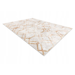 Vzorovaný koberec ve zlaté...